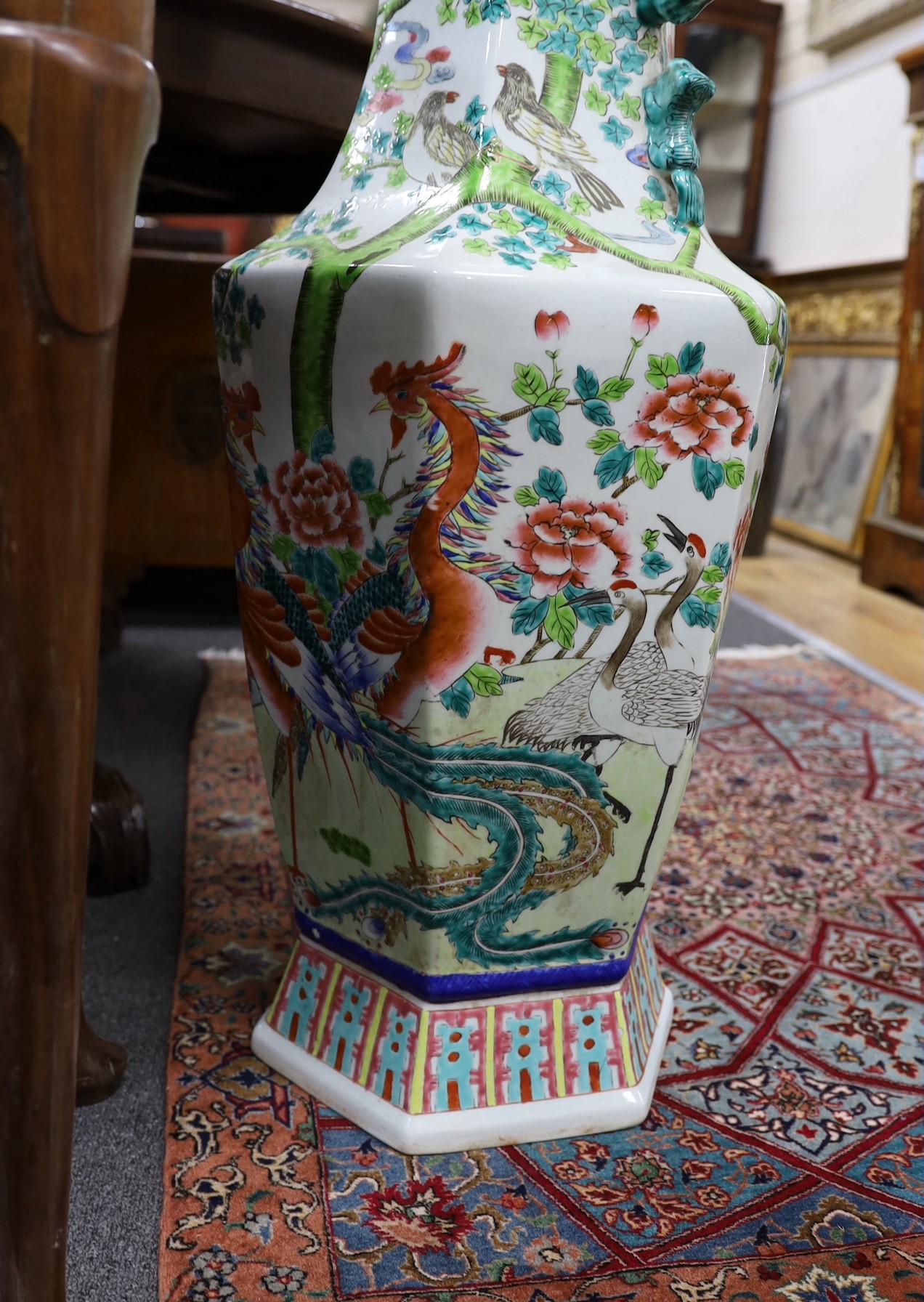 A large famille rose Chinese ‘phoenix and bird’ vase, 85cm high